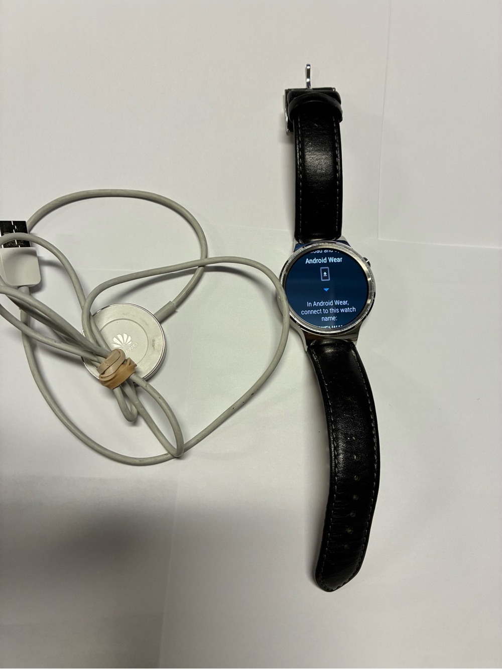 Huawei Smartwatch with Black Leather Strap and Silver Case